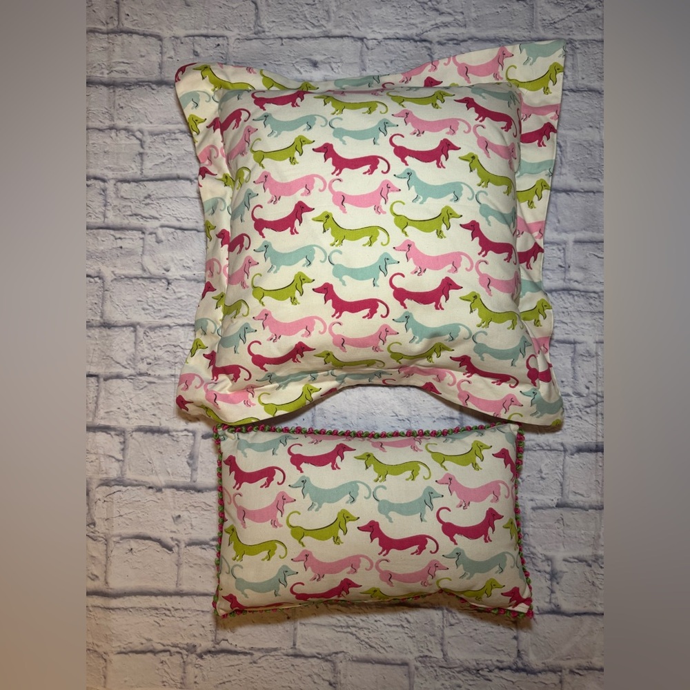2 Dachshund themed accent pillows. 1 (20x20) 1 (15X9). Multicolor and whimsical!